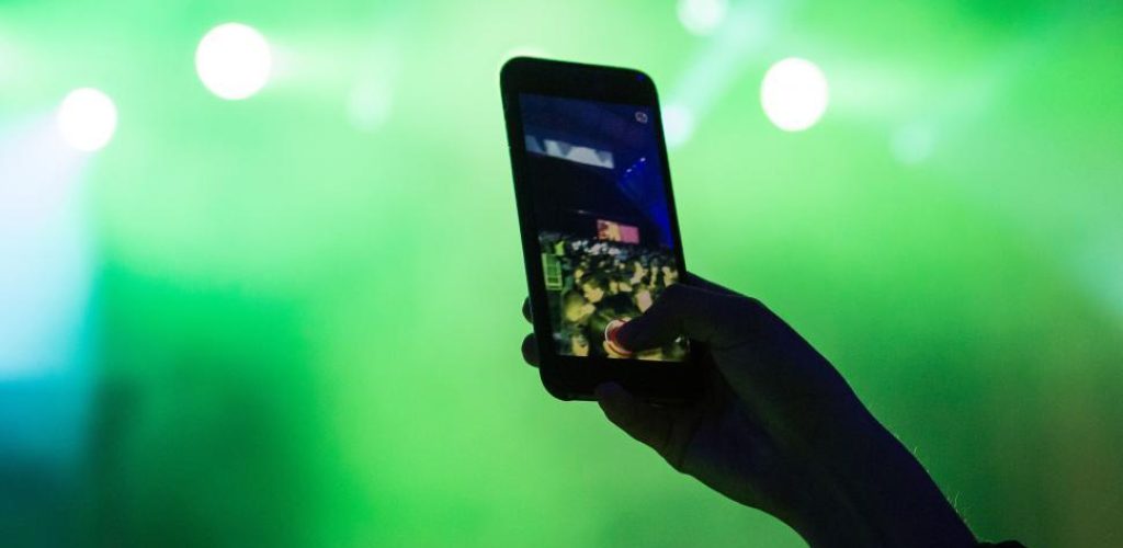 smartphone capturing concert smartphone capturing concert